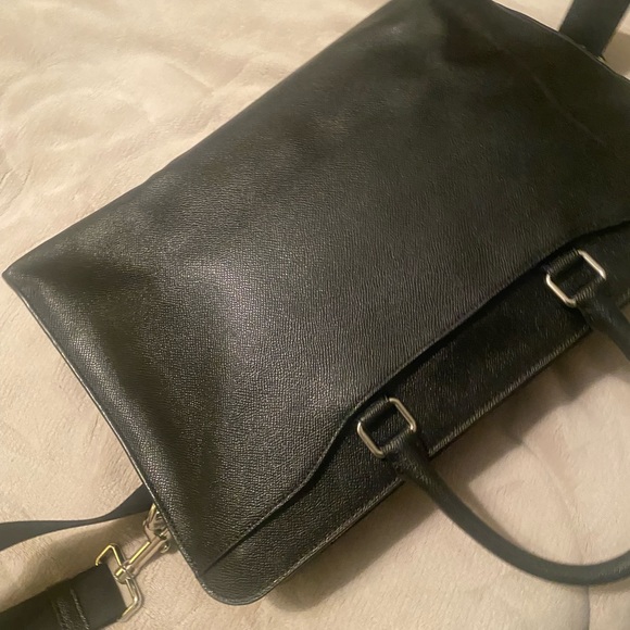 Coach briefcase. Posed w/purse pillow to demonstrate shape. Used once. No marks. - Picture 4 of 7